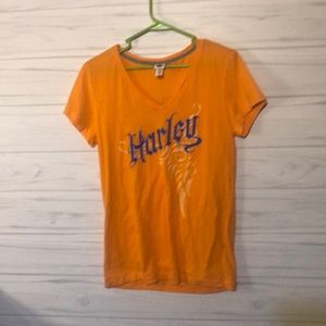 Woman’s medium graphic Harley Davidson tee shirt.